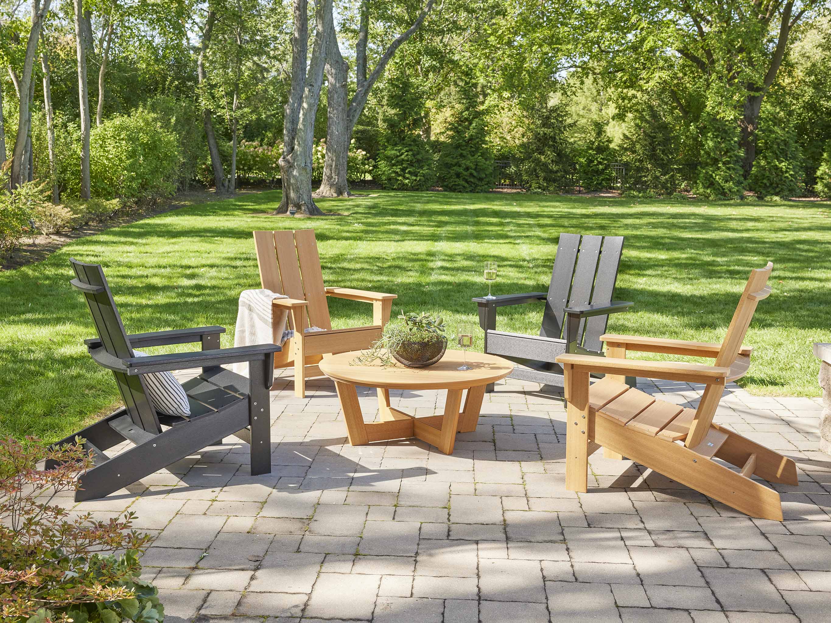 Natural Teak and Black Aria Adirondack Chairs with Cannon Beach Table