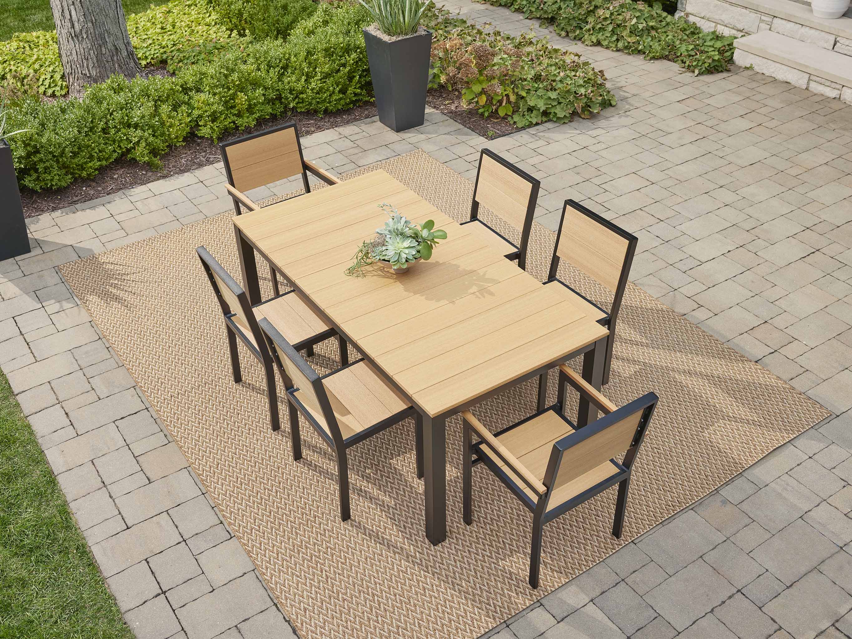 Park City Table from Above on a patio with rug