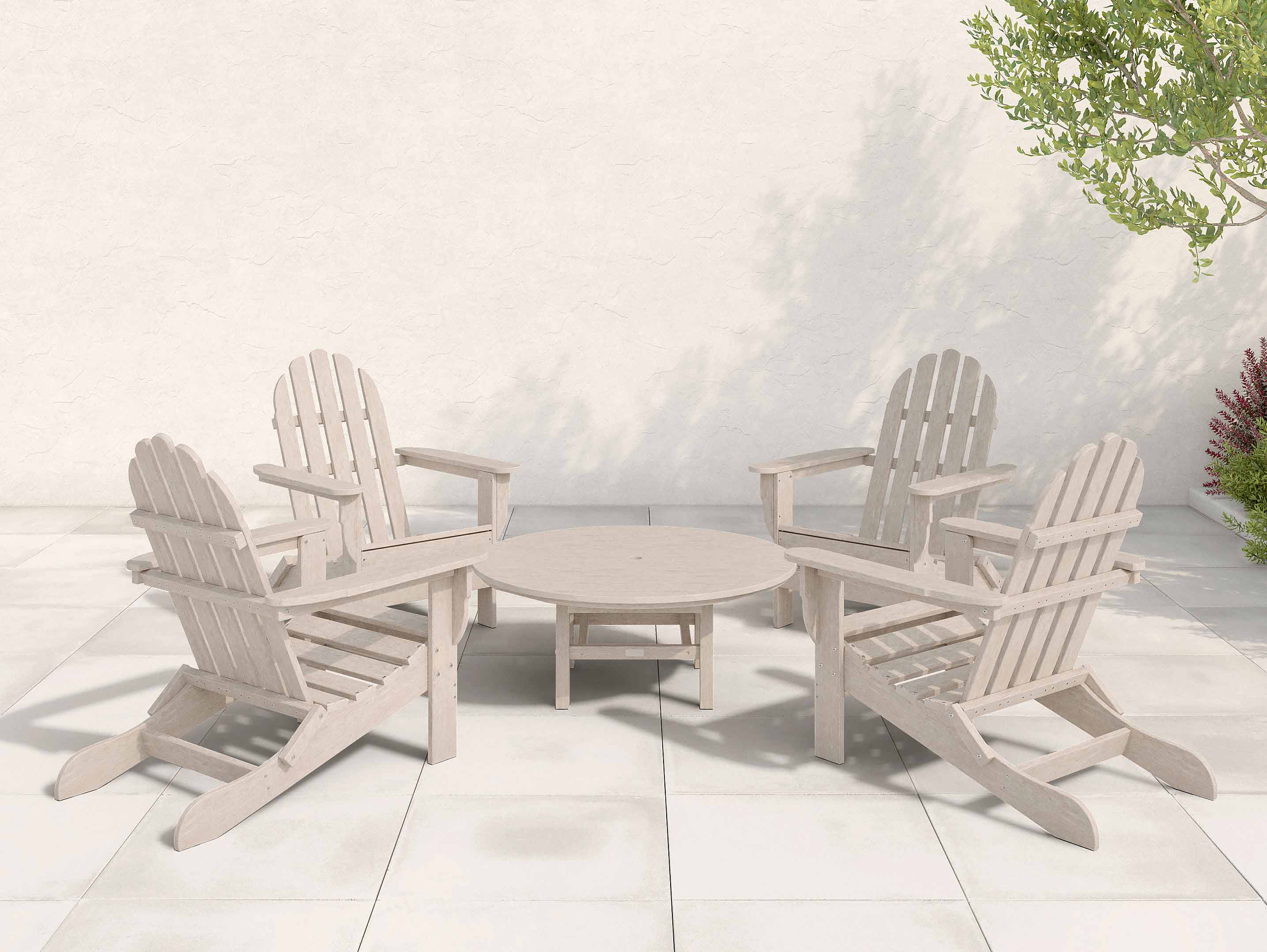 Four Paper Birch Classic Adirondack Chairs surrounding a Madison Conversation Table