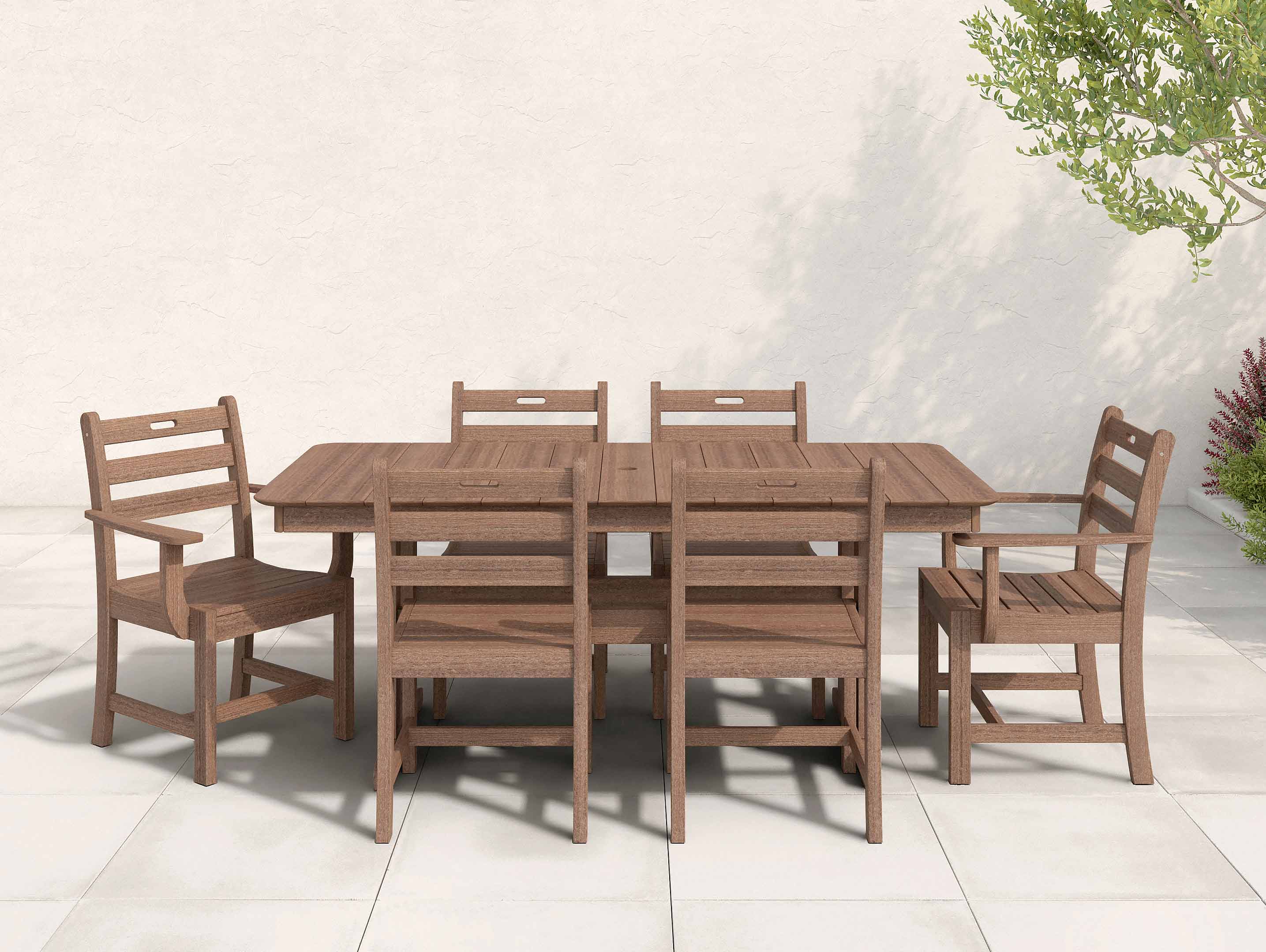 Antique Mahogany Classic Dining Set with ladder back chairs on patio