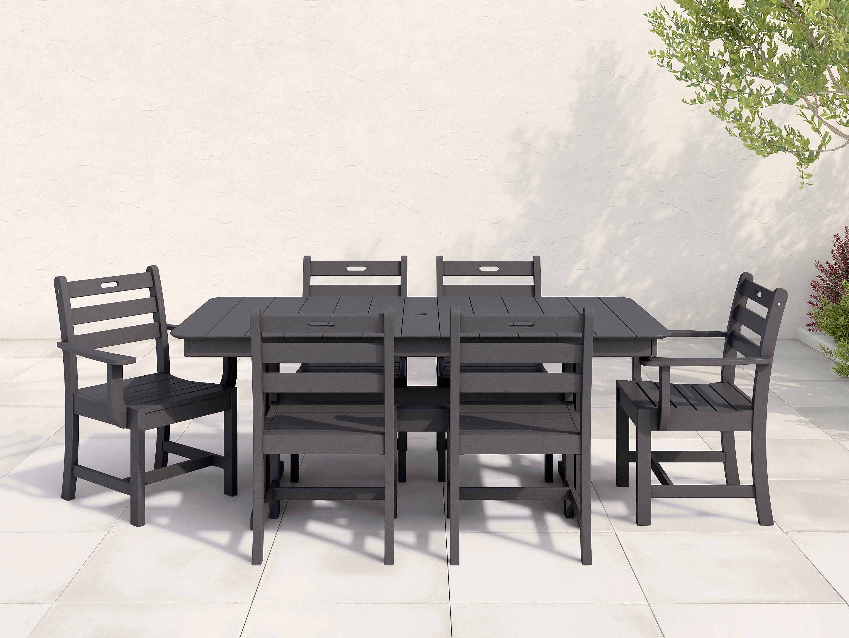 Black Classic Dining Set with ladder back chairs on patio
