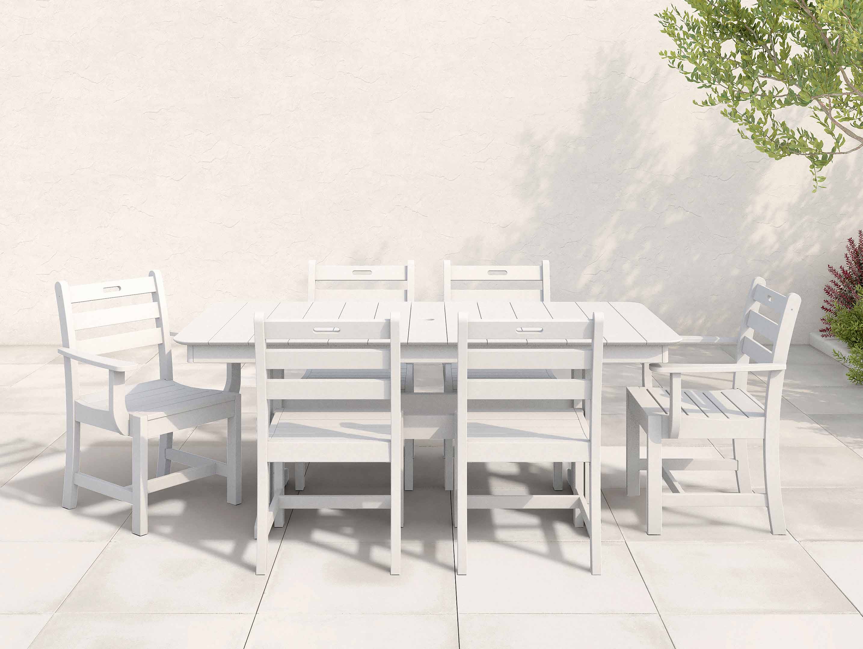 White Classic Dining Set with ladder back chairs on patio