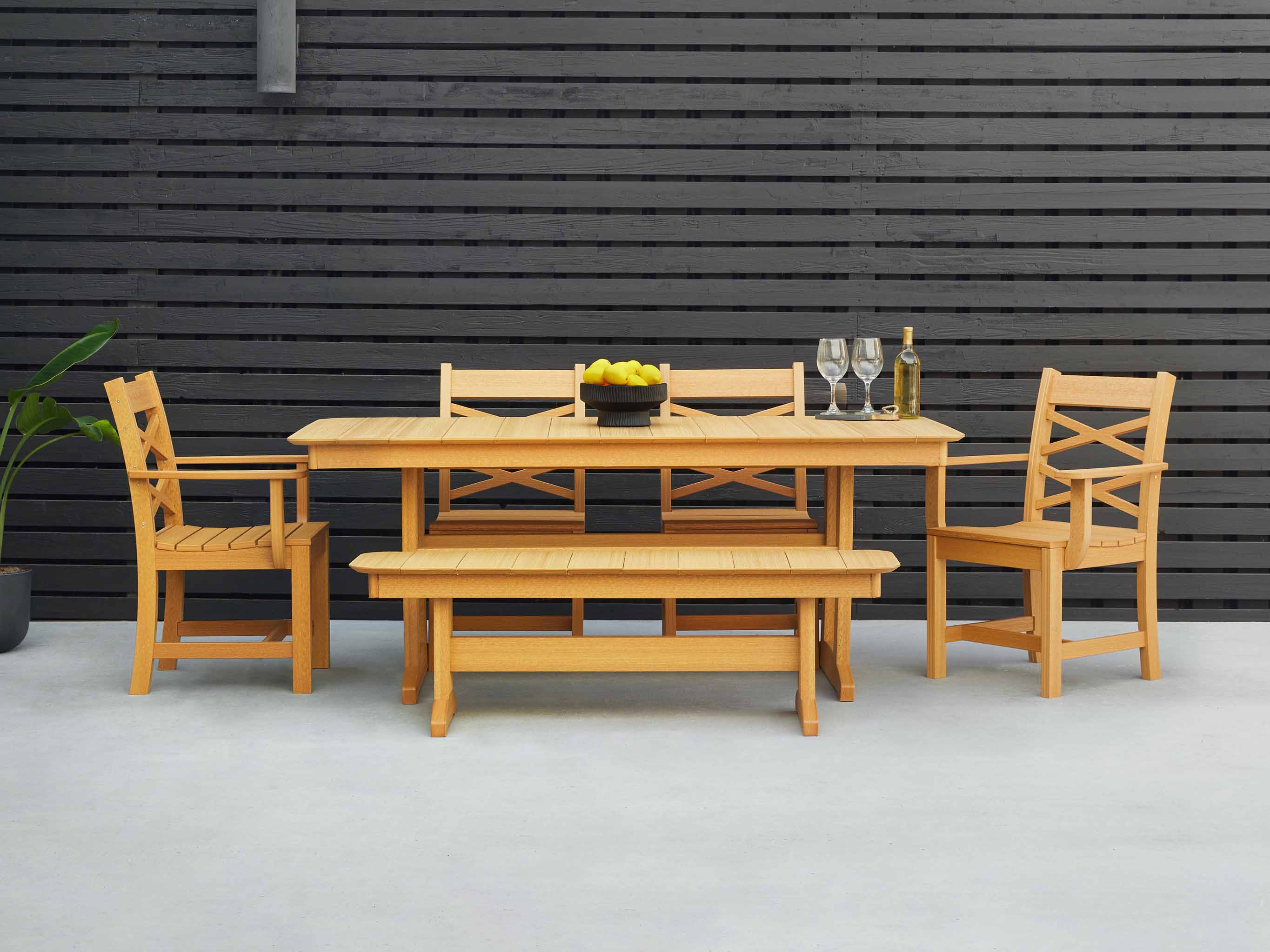 Natural Teak Classic Farmhouse Dining Set on patio