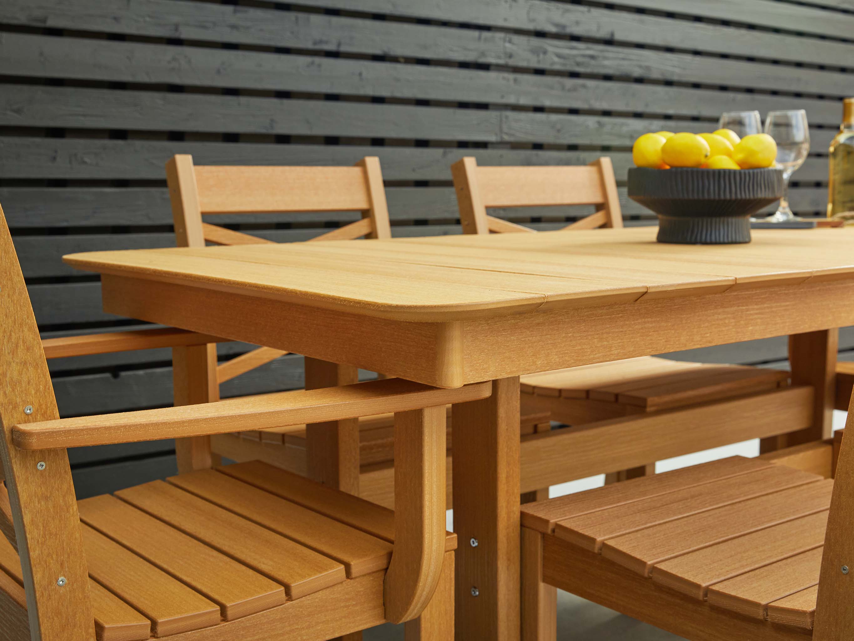 Classic 7-Piece Dining Set in Natural Teak Close Up from Side