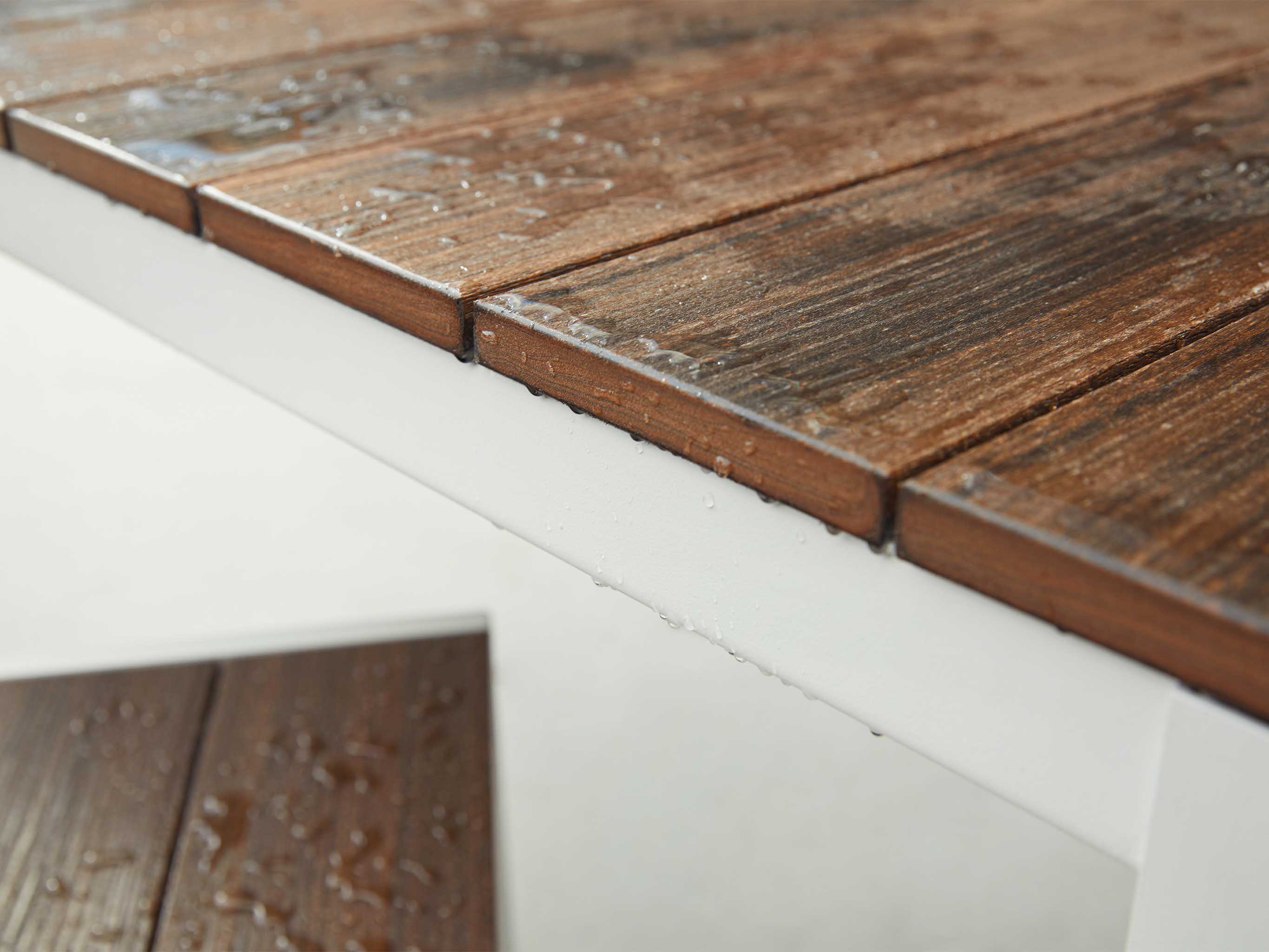 Water Beaded on Surface of Table Tangentwood