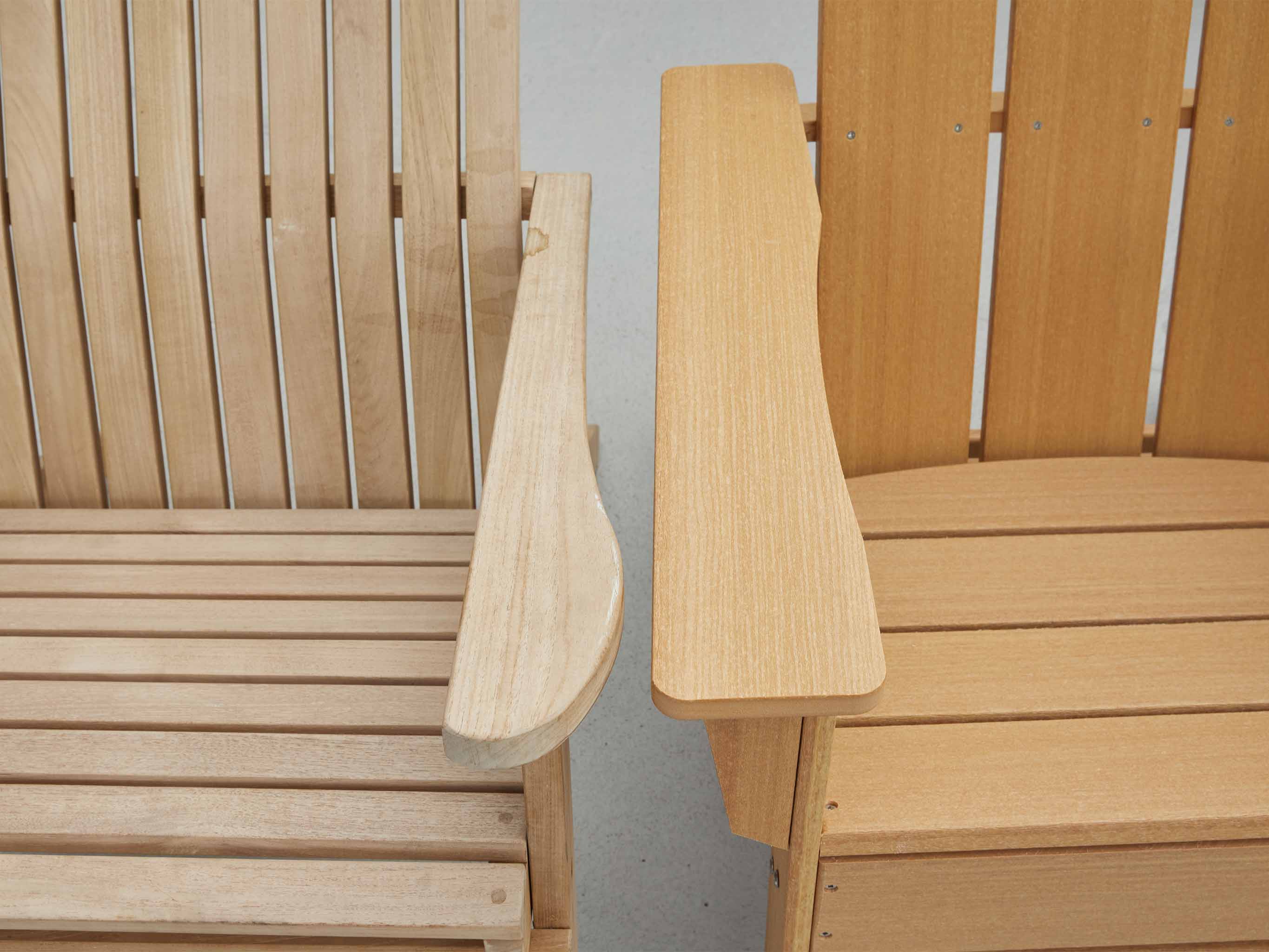Real wood teak chair next to a Tangentwood Natural Teak Chair